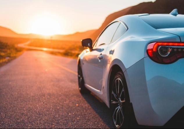 Rental car overlooking the sunset